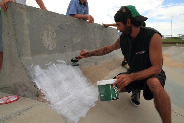 Applying the first layer of 'Bondcrete'