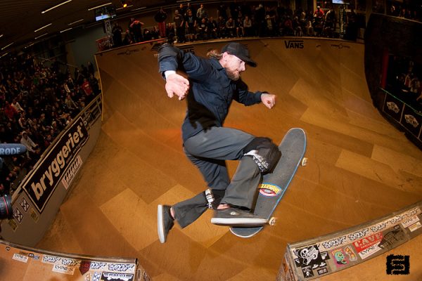 Mike Vallely. No comply over the channel.