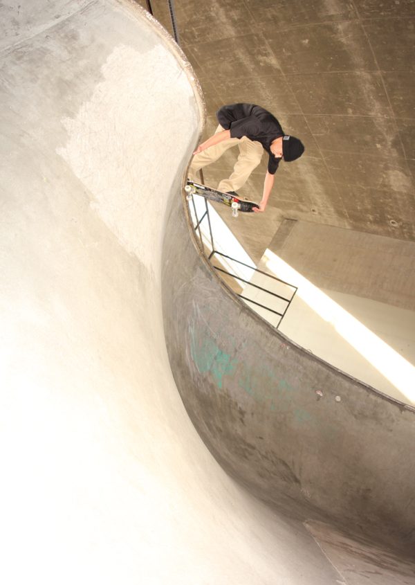 Robbie Russo bs layback over and in a slide, channel street skatepark