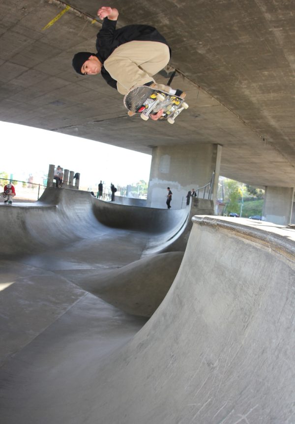 Robbie Russo goes indy over the hip at San Pedro´s old channel street skatepark section.