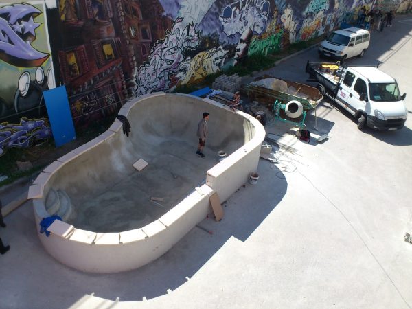 Putting in the pool coping.