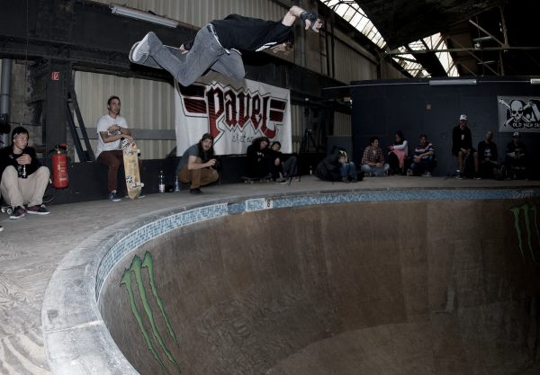 Skreech. Blasting a backside air in the deepend.  Photo: J. Hay