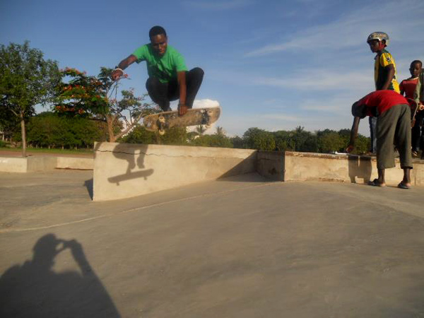 This is Gideon Lyimo, Tanzania's best skateboarder. He didn't compete in the contest because there was no any one to stand against him. At the end I gave him 10000 Tanzania shillings (5 euros)  to motivate him to keep skating. I believe he will be countries first pro skater. Shown here with a boneless to the bank. He is also my assistant. 