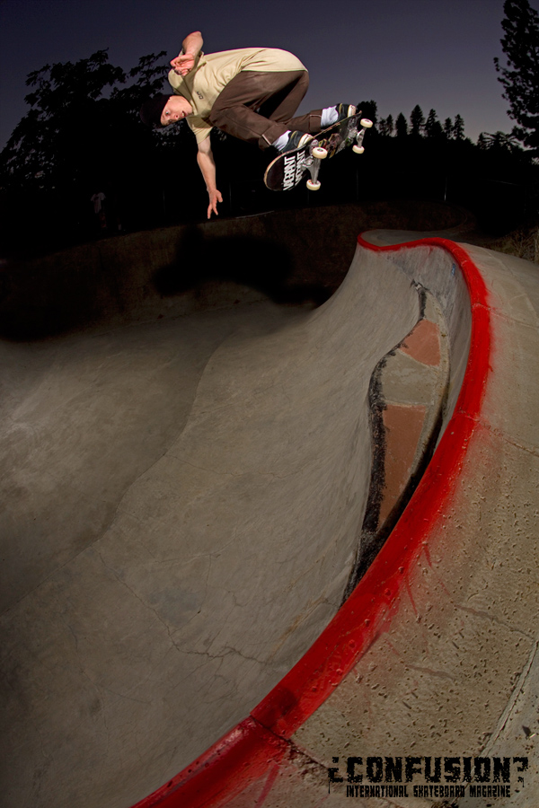 Frank Shaw backside ollie over the loveseat in the oververt pocket in Jacksonville, Oregon.  Photo: Garric Ray