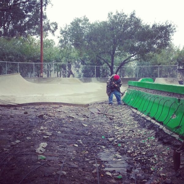 Mark Hertenstein working in the rain.