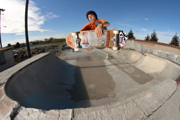 Alex likes to ride his board backwards