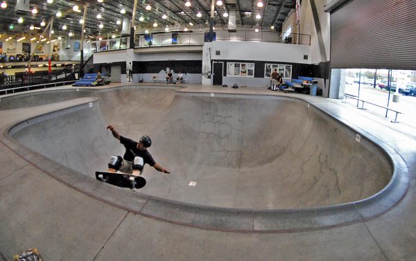 Mike Serna. Frontside grind at the Combi replica in Orange, California.