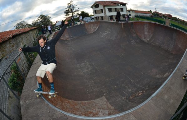 Ale. Stand up frontside grind around the corner. 