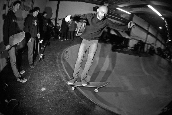 Jerson. Two feet back frontside standup grind around the deepend. 
