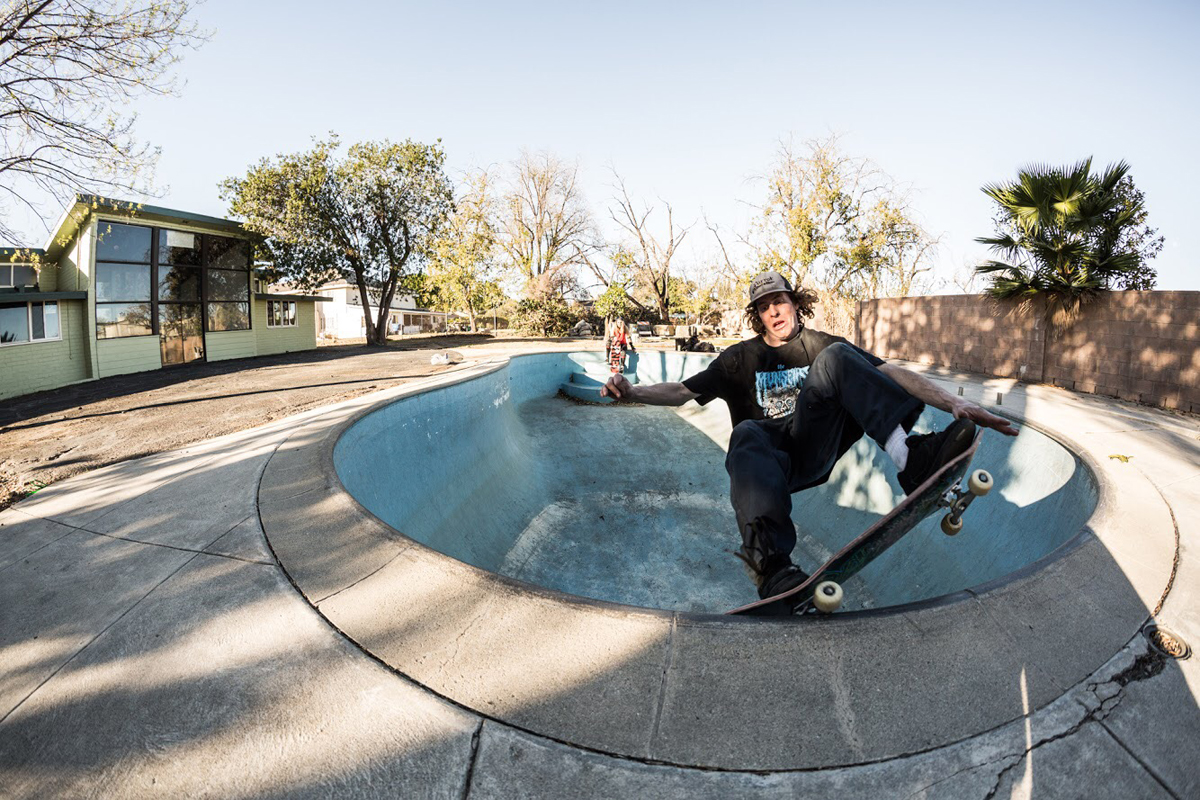 Chuck Pontone. Nose grind tail grab.